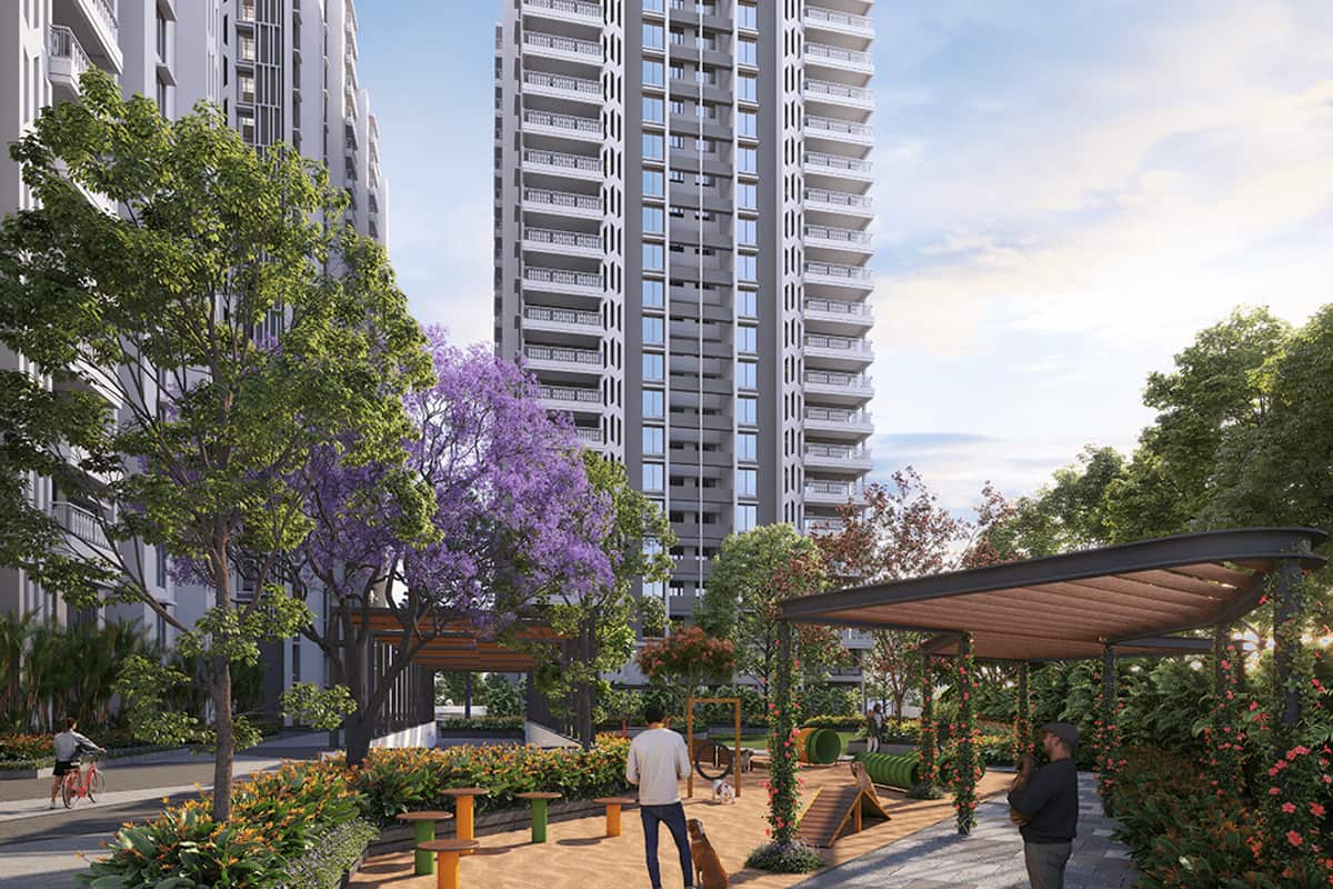 Ananda The Legacey: Pergola seating near a tower